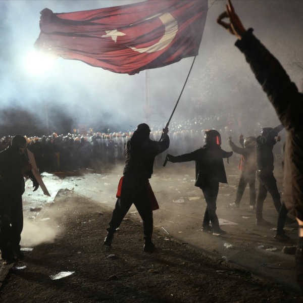 Turkish police face demonstrators in Istanbul during clashes after opposition arrest